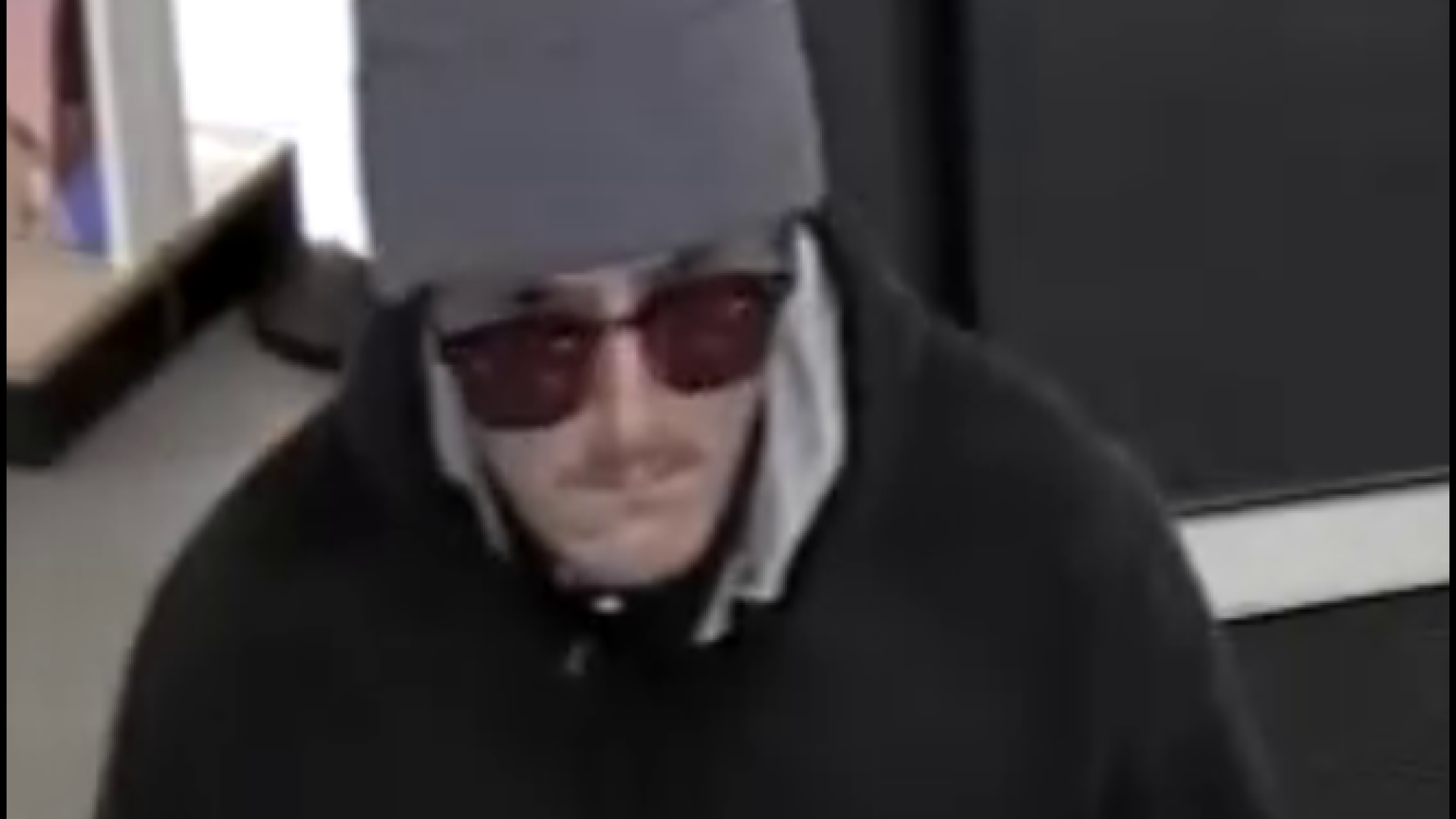Described suspect captured on surveillance cameras