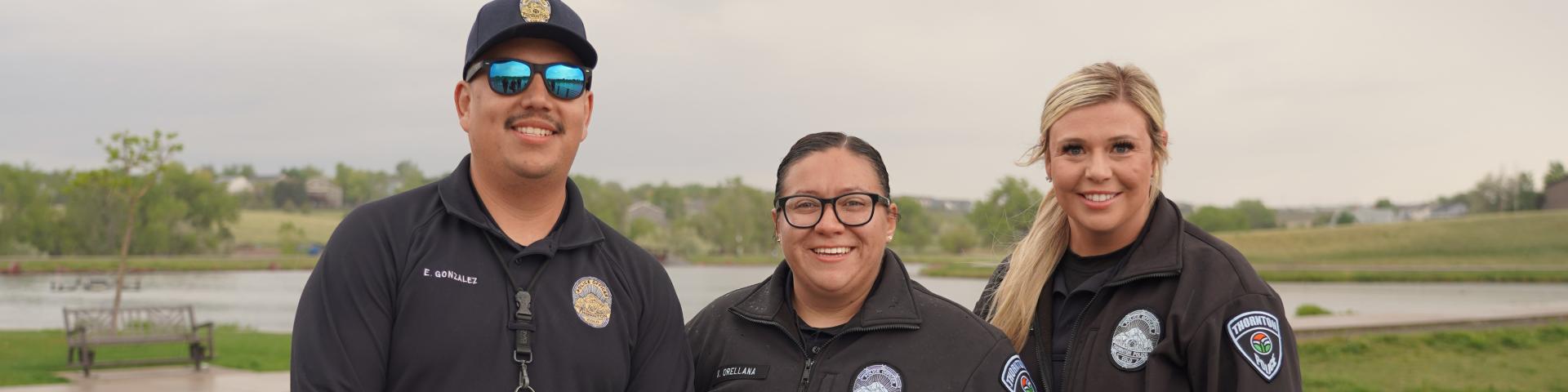 Officers smiling at the camera